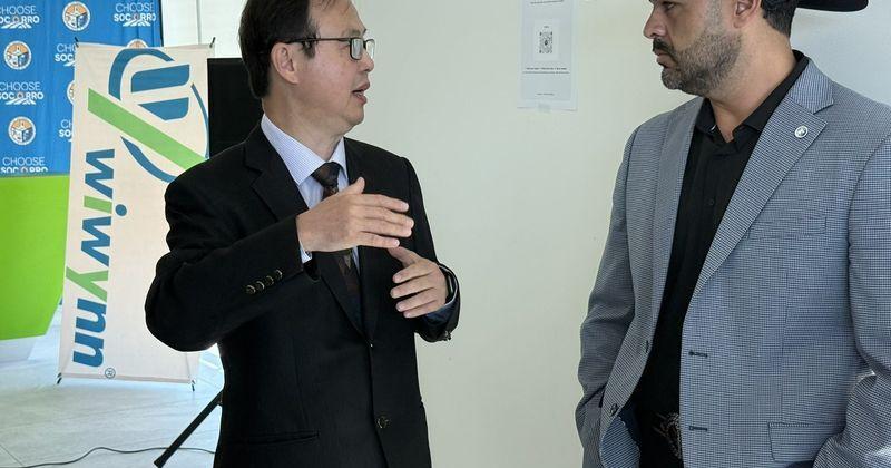 Joseph Hsu, left, managing director of Wiwynn North America operations, talks to Socorro Mayor Rudy Cruz Jr., prior to an Aug. 21 event announcing the Taiwan company's manufacturing expansion in the Socorro Logistics Center industrial park.