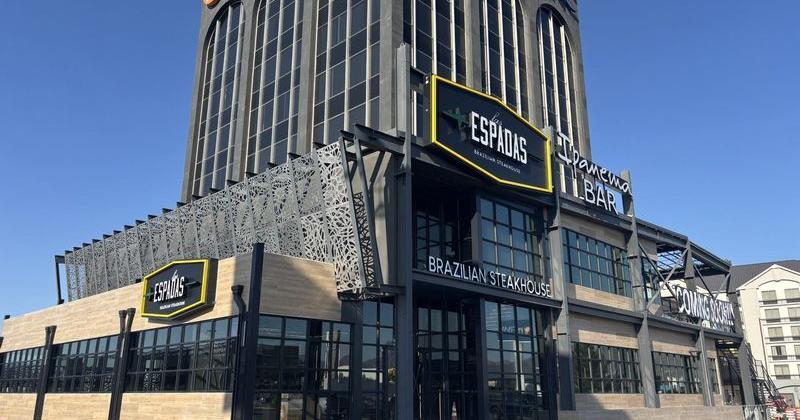 Signage and construction work for Las Espadas Brazilian steakhouse is taking place at the base of the PNC Bank building, at 6044 Gateway Blvd. E.