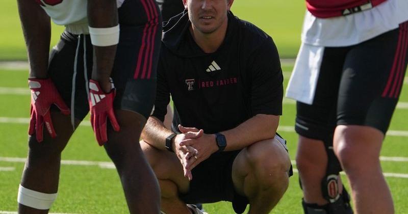 Texas Tech offensive coordinator Mack Leftwich watches a drill during football practice, Wednesday, Aug. 5, 2026, at the Womble Football Center.