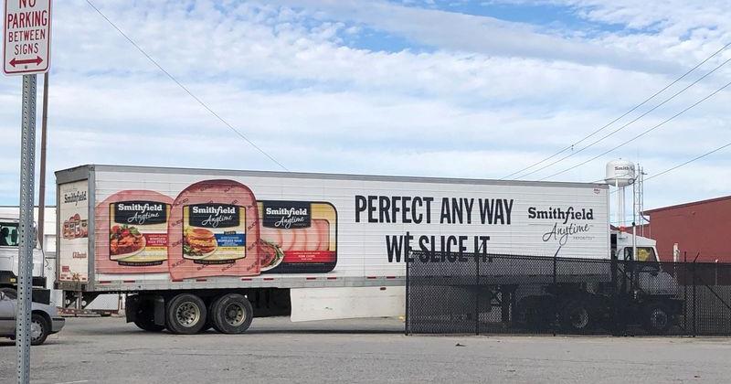 FILE PHOTO: A truck arrives at Smithfield Foods' pork plant in Smithfield