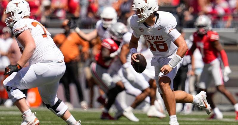 Texas Longhorns quarterback Arch Manning (16) runs during the second half of the NCAA football game against the Ohio State Buckeyes at Ohio Stadium on Aug. 30, 2025. Ohio State won 14-7.