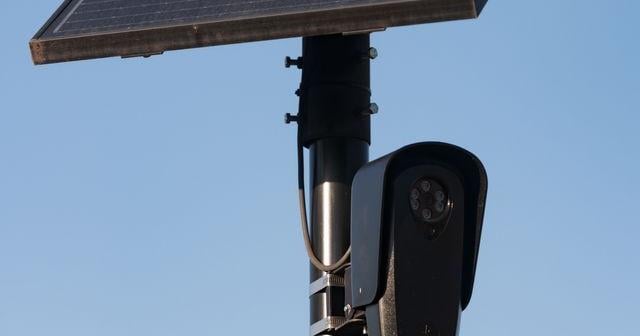 A Flock Safety Falcon camera stands watch along the Ohio River Scenic Byway in downtown Evansville, Indiana, on Tuesday, Jan. 6, 2025. The cameras are the first link in a nationwide surveillance network tracking Americans' movements.