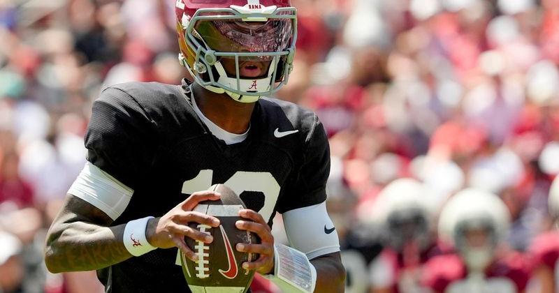 April 11, 2026; Tuscaloosa, AL, USA; Alabama quarterback Keelon Russell rolls out and throws a touchdown pass at Bryant-Denny