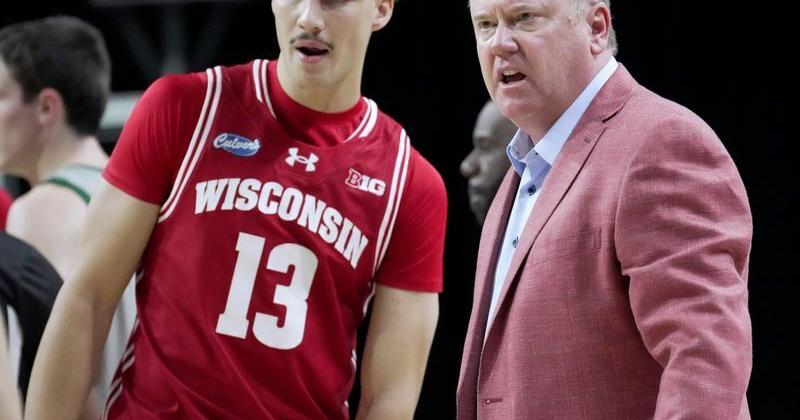 Wisconsin head coach Greg Gard talks with guard Hayden Jones (13) during the second half of their preseason game Thursday, Oct.