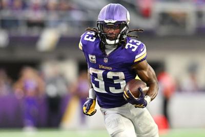 Report: Vikings RB Aaron Jones (knee) avoids serious injury | Sports ...