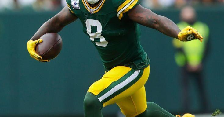 Green Bay Packers running back Josh Jacobs (8) runs the ball during a game against the Cincinnati Bengals on Oct. 12, 2025, at