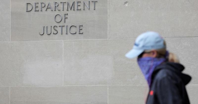 Signage is seen at the headquarters of the United States Department of Justice (DOJ) in Washington, D.C., U.S.