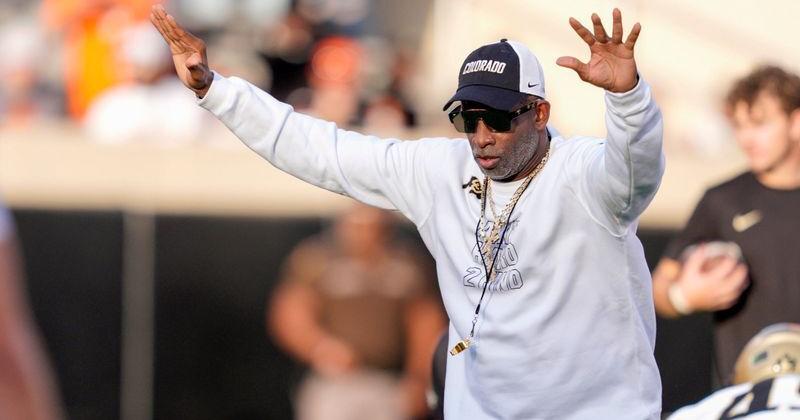Colorado coach Deion Sanders stands on the field as the team warms up before a college football game between the Oklahoma State Cowboys and the Colorado Buffaloes at Boone Pickens Stadium in Stillwater, Okla., Saturday, Oct. 24, 2026.