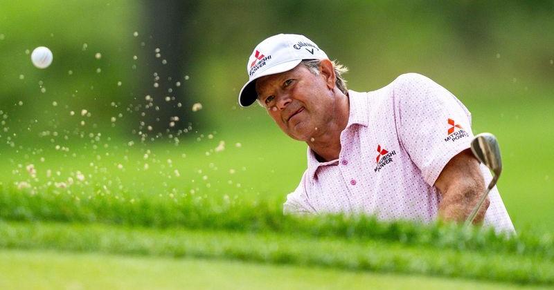 Retief Goosen hits out of a sand trap to the green on the ninth hole during round 2 of the Kaulig Companies PGA Championship,