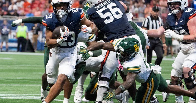 Auburn Tigers running back Jeremiah Cobb (23) breaks free for a rushing touchdown as Auburn Tigers take on Baylor Bears in the