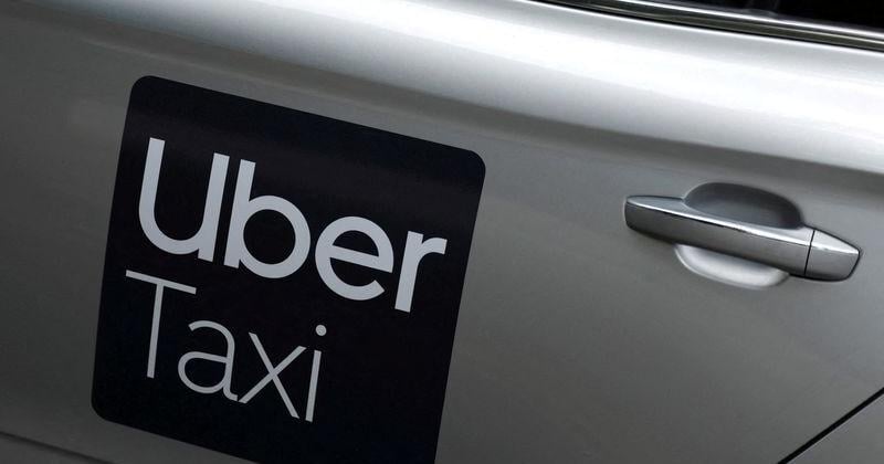 FILE PHOTO: Uber logo seen on a taxi in Dublin