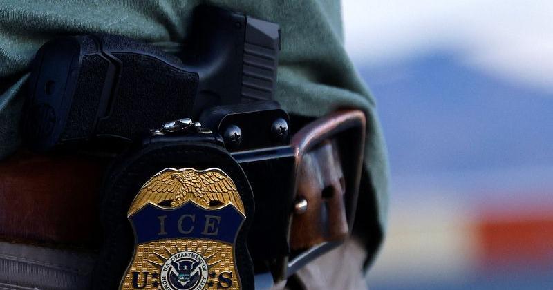 Migrants are transferred to a plane to be expelled under Title 42 from U.S., in El Paso