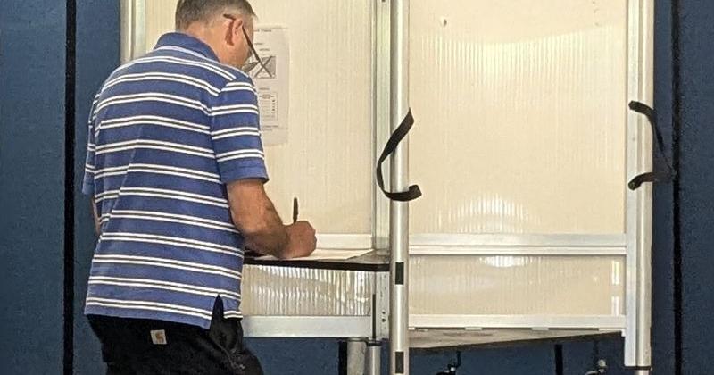 A Winooski resident votes in Vermont's statewide primary election at the Winooski Senior Center, the city's polling station, on Aug. 11, 2026.