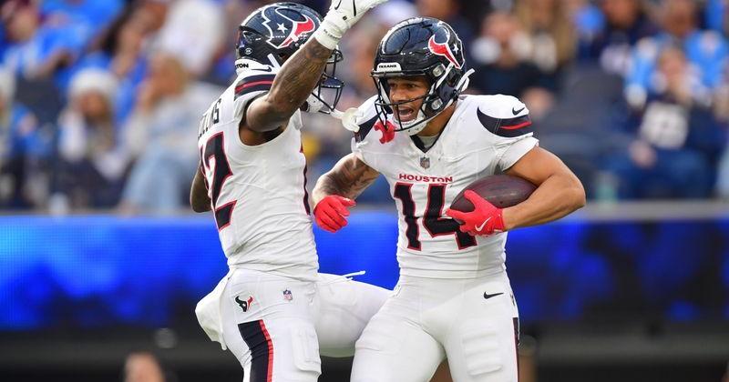 Dec 27, 2025; Inglewood, California, USA; Houston Texans wide receiver Jaylin Noel (14) reacts with wide receiver Nico Collins (12) after catching a touchdown against the Los Angeles Chargers during the first half at SoFi Stadium. Mandatory Credit: Gary A. Vasquez-Imagn Images