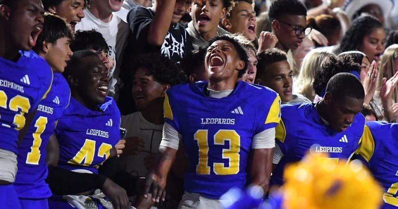 Legacy players celebrate with the student section after defeating Grapevine in a game on, Friday, Aug. 28, 2026, at Memorial Stadium in Wichita Falls.