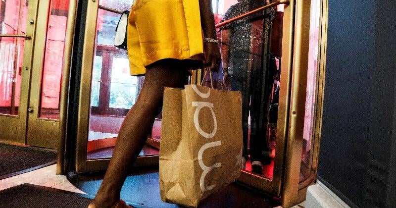FILE PHOTO: People shop at Macy’s department store in Manhattan in New York