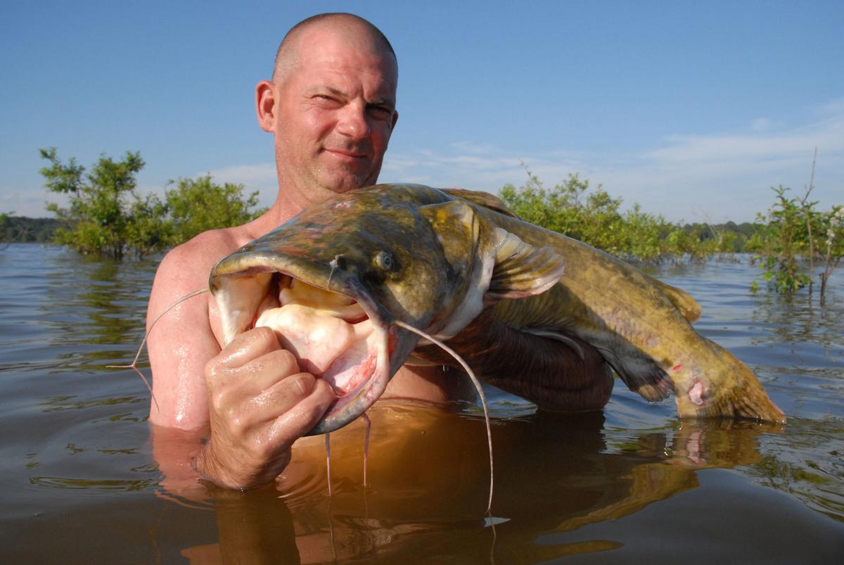 GETTIN’ BIT: Catfish noodling is a family affair for East Texas