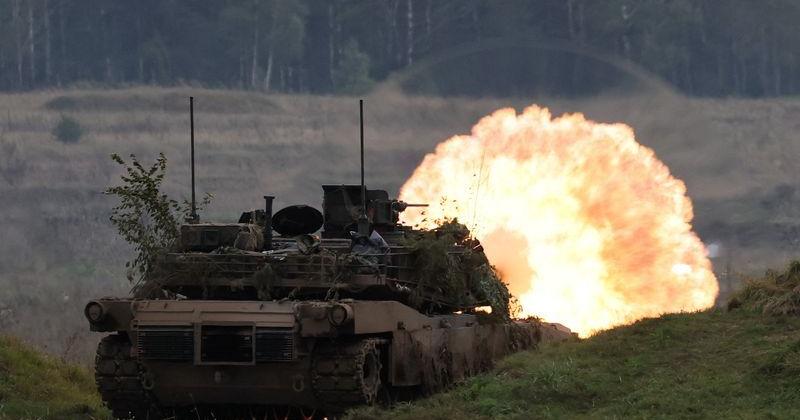 Polish forces with NATO soldiers hold military exercises 'Iron Defender' at Orzysz training ground in Wierzbiny
