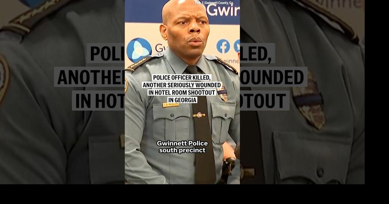 Police officer killed, another seriously wounded in hotel room shootout ...