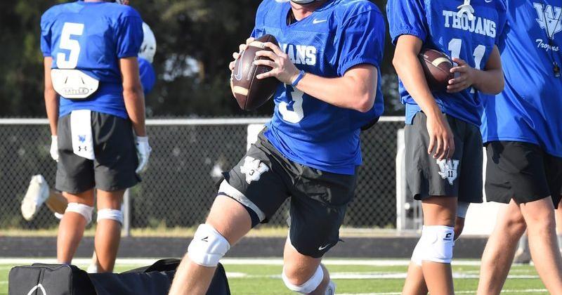 Windthorst High School's Brock Belcher looks to throw down field during day four of football practice on, Thursday, Aug. 6, 2026, in Windthorst.