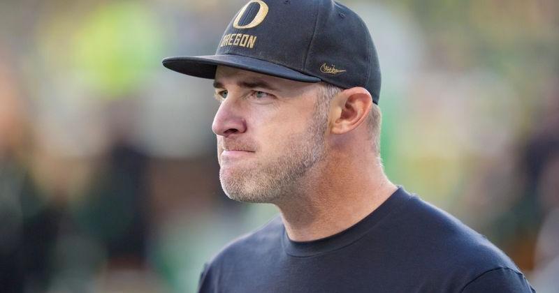 Oregon offensive coordinator Drew Mehringer walks the field before the game as the Oregon Ducks host the Portland State Vikings
