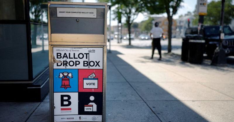 FILE PHOTO: A ballot drop box outside a public library, in Boston
