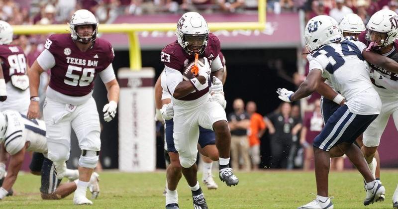Sep 6, 2025; College Station, Texas, USA; Texas A&M Aggies running back Jamarion Morrow (23) runs the football during the second half against the Utah State Aggies at Kyle Field. Mandatory Credit: Sean Thomas-Imagn Images