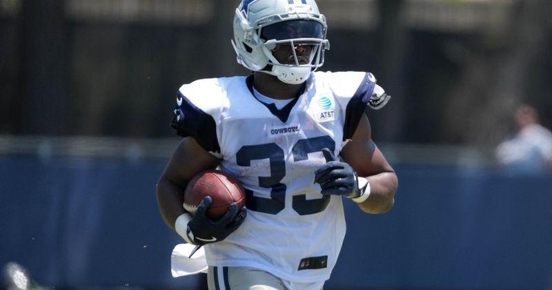 Jul 27, 2025; Oxnard, CA, USA; Dallas Cowboys running back Javonte Williams (33) carries the ball at training camp at the River Ridge Fields. Mandatory Credit: Kirby Lee-Imagn Images
