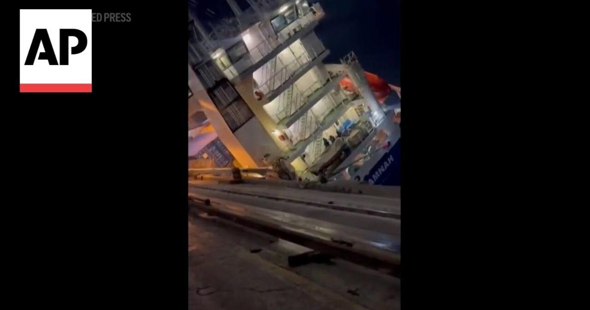 Container Freighter Spill Container ship spills cargo at Istanbul port after tilting sideways ...