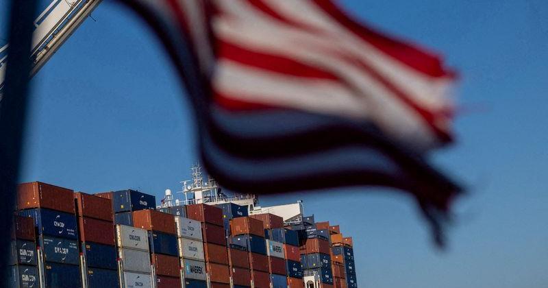 FILE PHOTO: A cargo ship full of shipping containers is seen at the port of Oakland, California