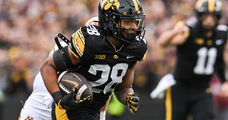 Iowa City, Iowa, USA; Iowa Hawkeyes running back Kamari Moulton runs the ball against the Minnesota Golden Gophers during the first quarter at Kinnick Stadium.