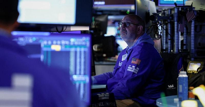 Wall Street hits record highs as weak jobs data eases rate-hike fears