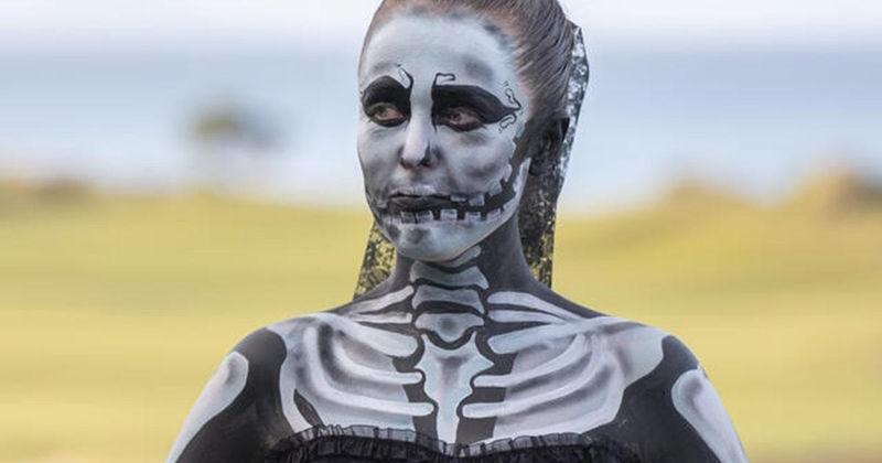 A golf fan celebrates Halloween at the Asia-Pacific Amateur Championship in New Zealand. A golf fan celebrates Halloween at the Asia-Pacific Amateur Championship in New Zealand.
