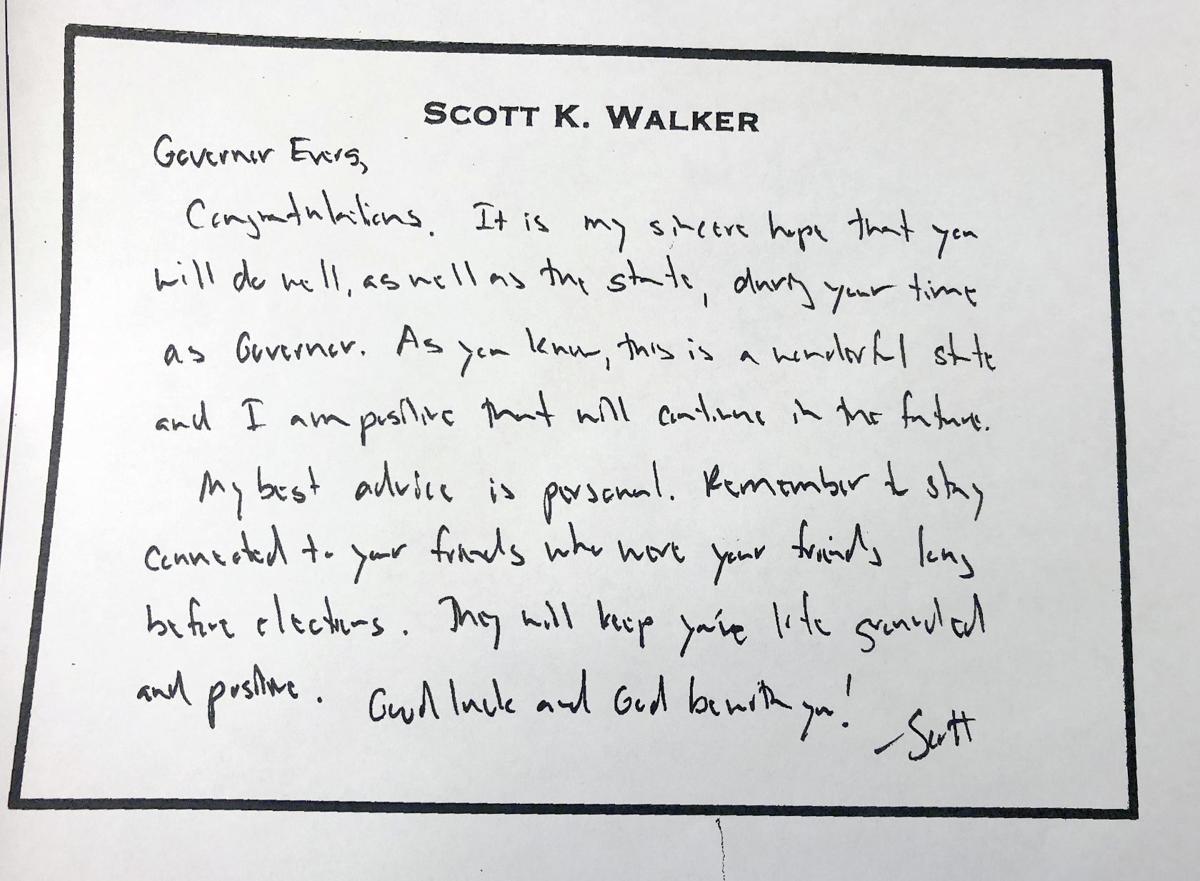 Scott Walker to Tony Evers note, AP photo