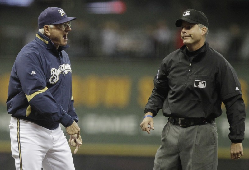 Philadelphia Phillies manager Jim Fregosi argues with umpires