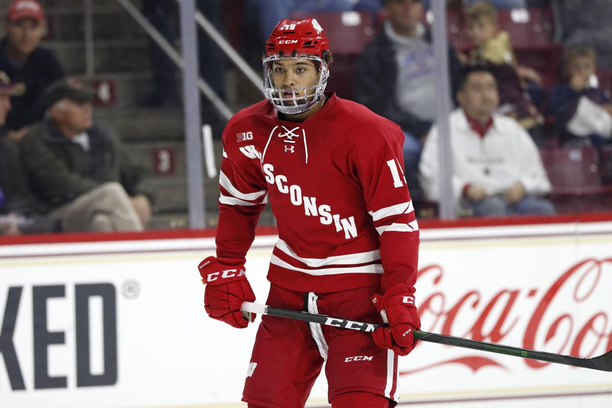 Strong support system has helped Wisconsin Badgers defenseman K'Andre Miller  become a top hockey talent