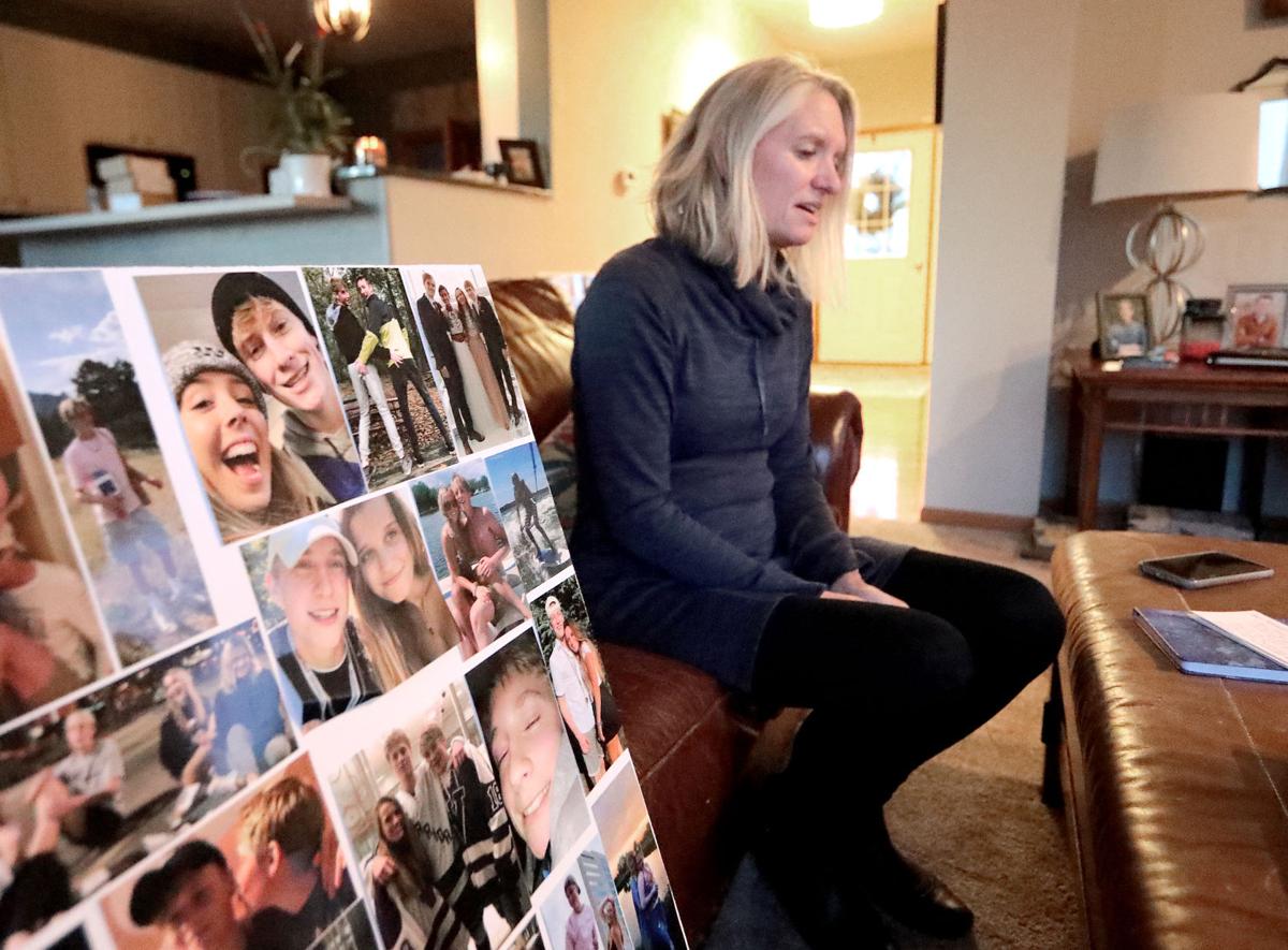 Michelle with photos of Cade