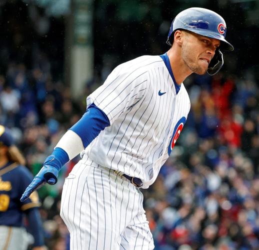 Ian Happ gets 3 hits as Cubs beat Brewers 5-4 on opening day