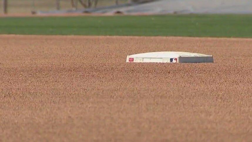 Milwaukee Brewers starting pitcher Corbin Burnes throws against the  Cincinnati Reds during the first inning of a spring training baseball game,  Monday, March 13, 2023, in Goodyear, Ariz. (AP Photo/Matt York Stock