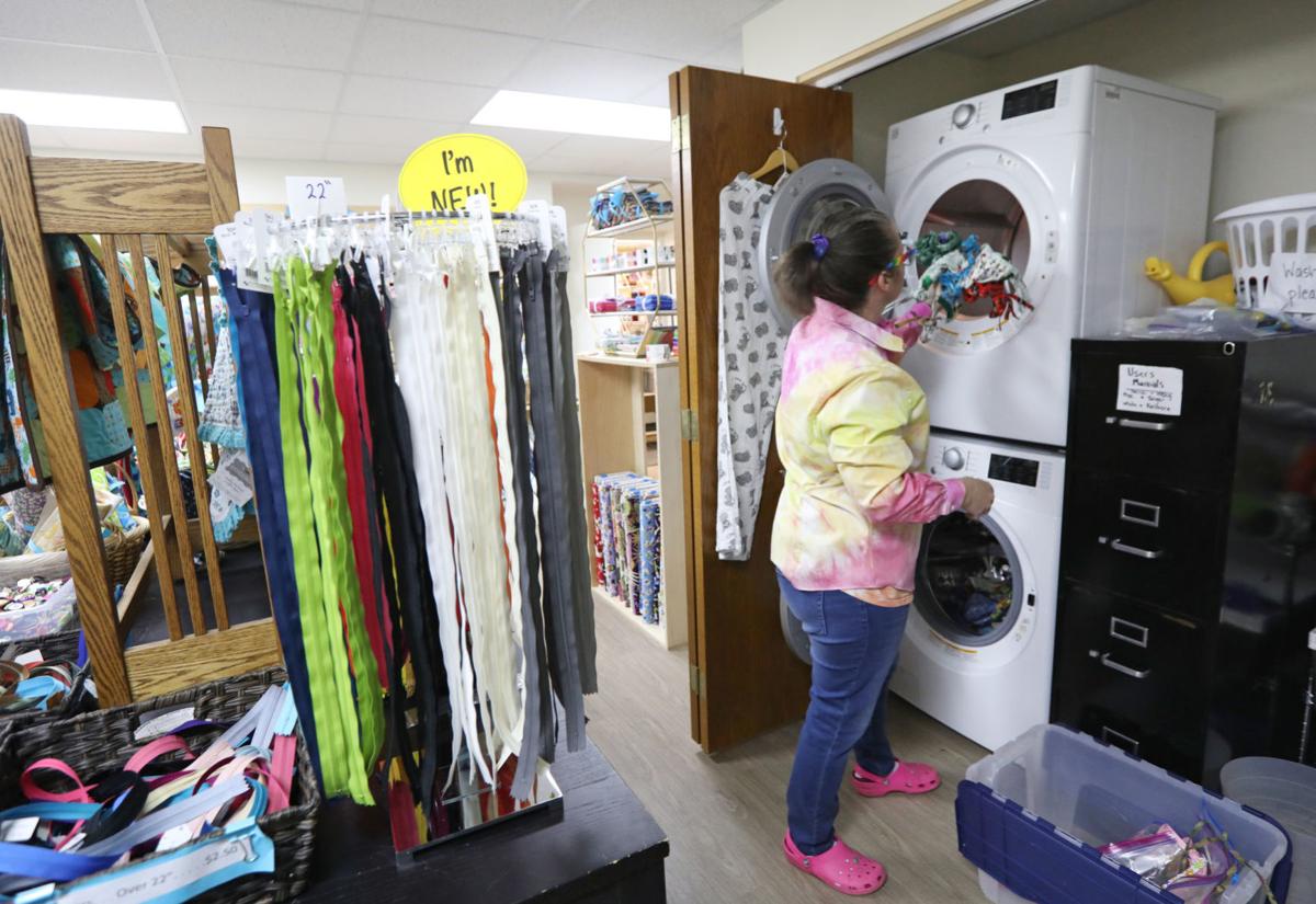 Despite Conflicting Signals Volunteers Stitch Cloth Masks To Ease