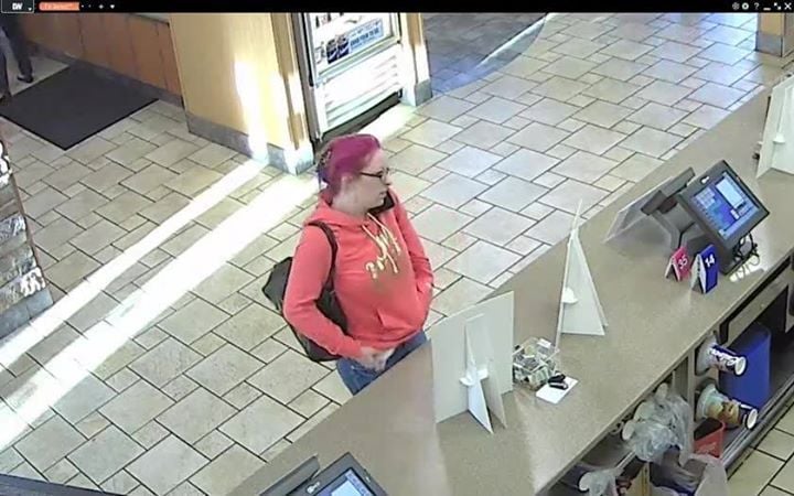 Woman caught on video allegedly stealing donation box off restaurant ...