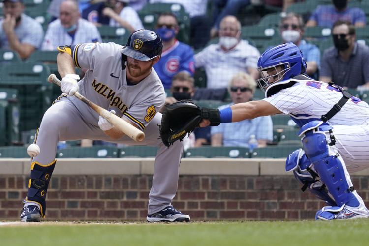 Brewers 4, Cubs 2 (10 innings): Lorenzo Cain's two homers lead the way