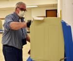 Disinfecting poll stations in Portage