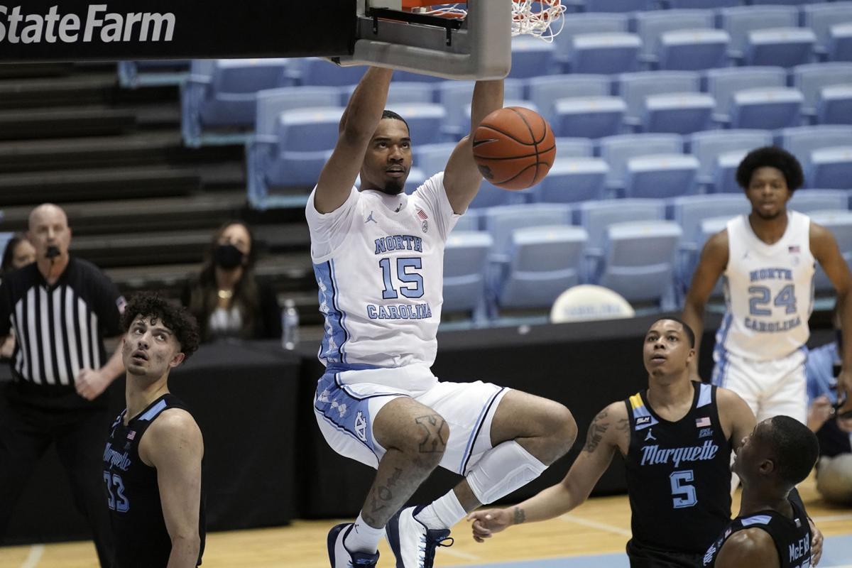 Mike Young is ACC coach of the year, Sam Hauser on All-ACC 1st team