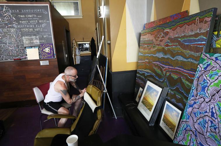 amid East win Side art coffee a shop pandemic scores through