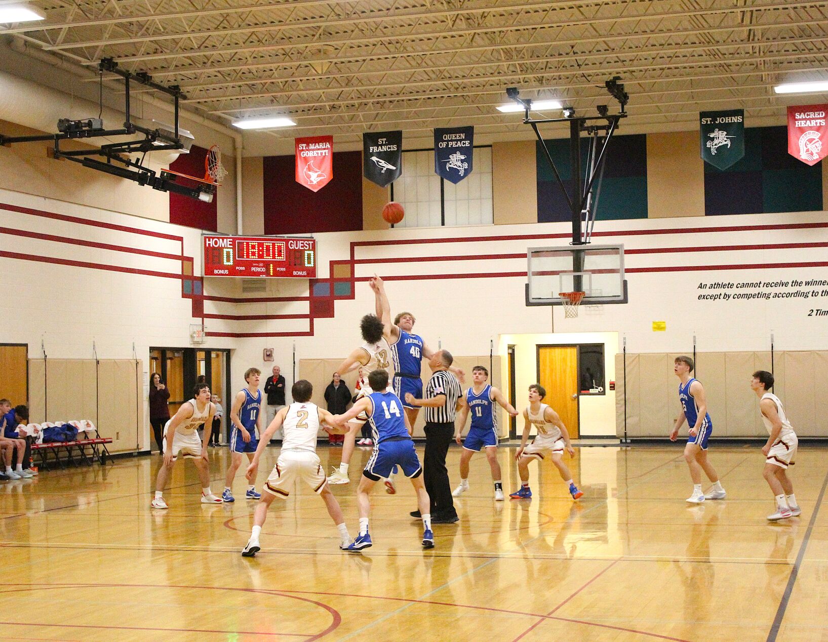 Photos: Madison St. Ambrose boys basketball hosts Randolph