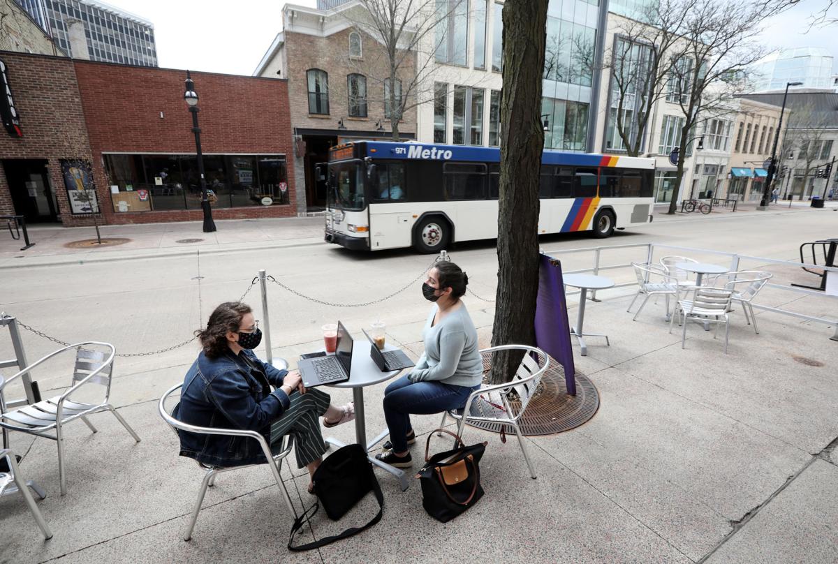 Diners with bus in background