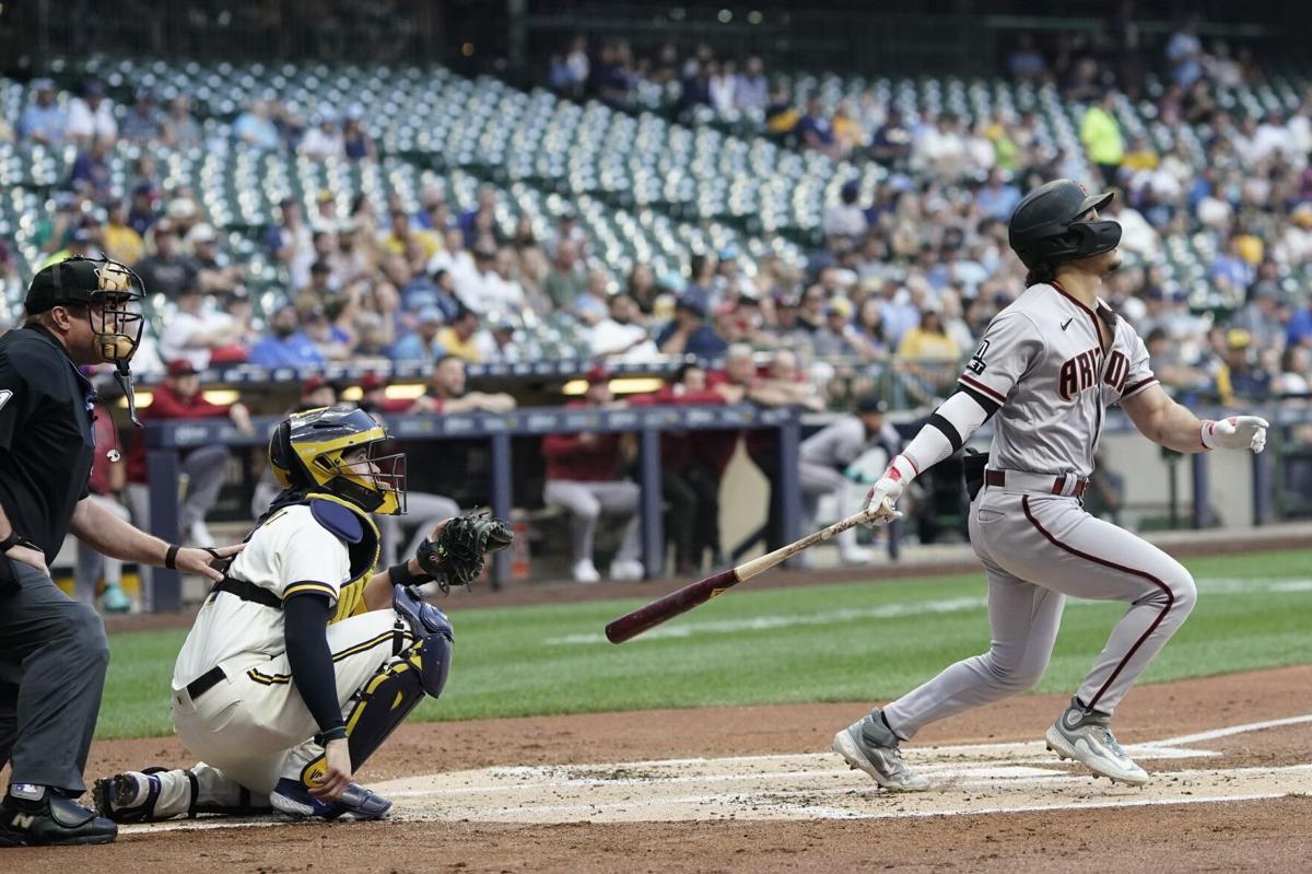 Swanson homers twice, Braves hold on to beat Giants 7-6