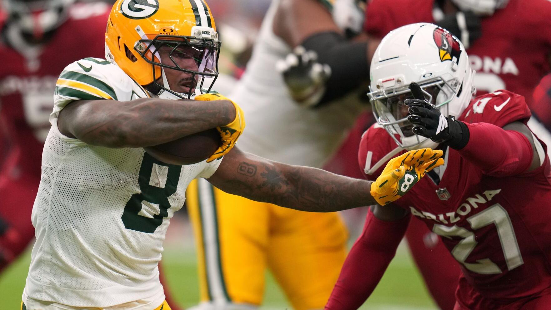 Josh Jacobs runs for 2 TDs, Micah Parsons has 3 sacks as Packers rally past Cardinals 27-23