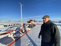 Grooming the snowmobile trail